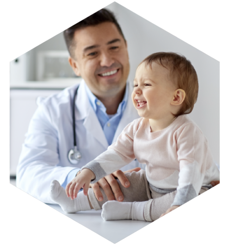 happy-doctor-or-pediatrician-with-baby-at-clinic-PAX9NLY